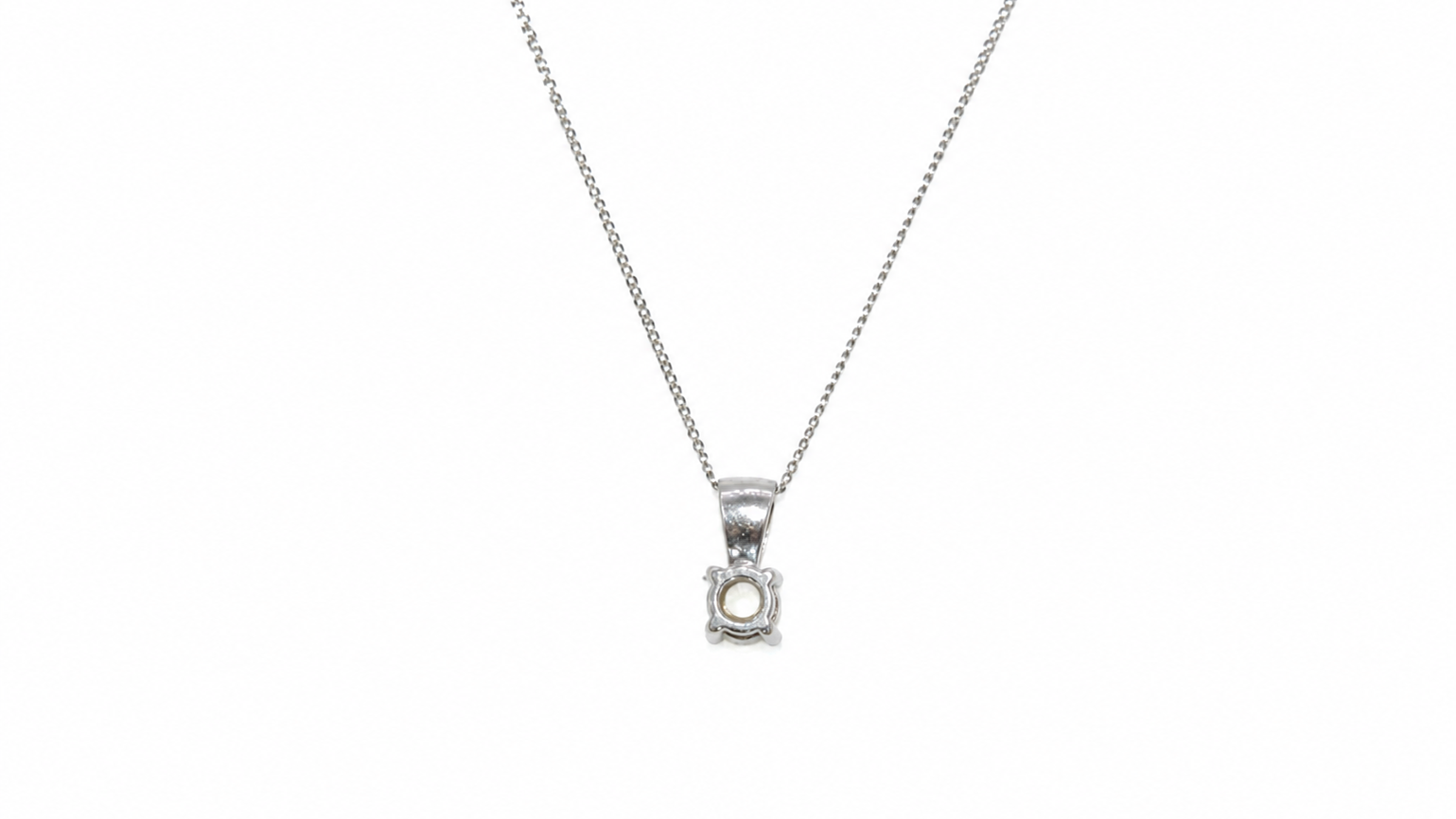 Reverse view of diamond solitaire pendant