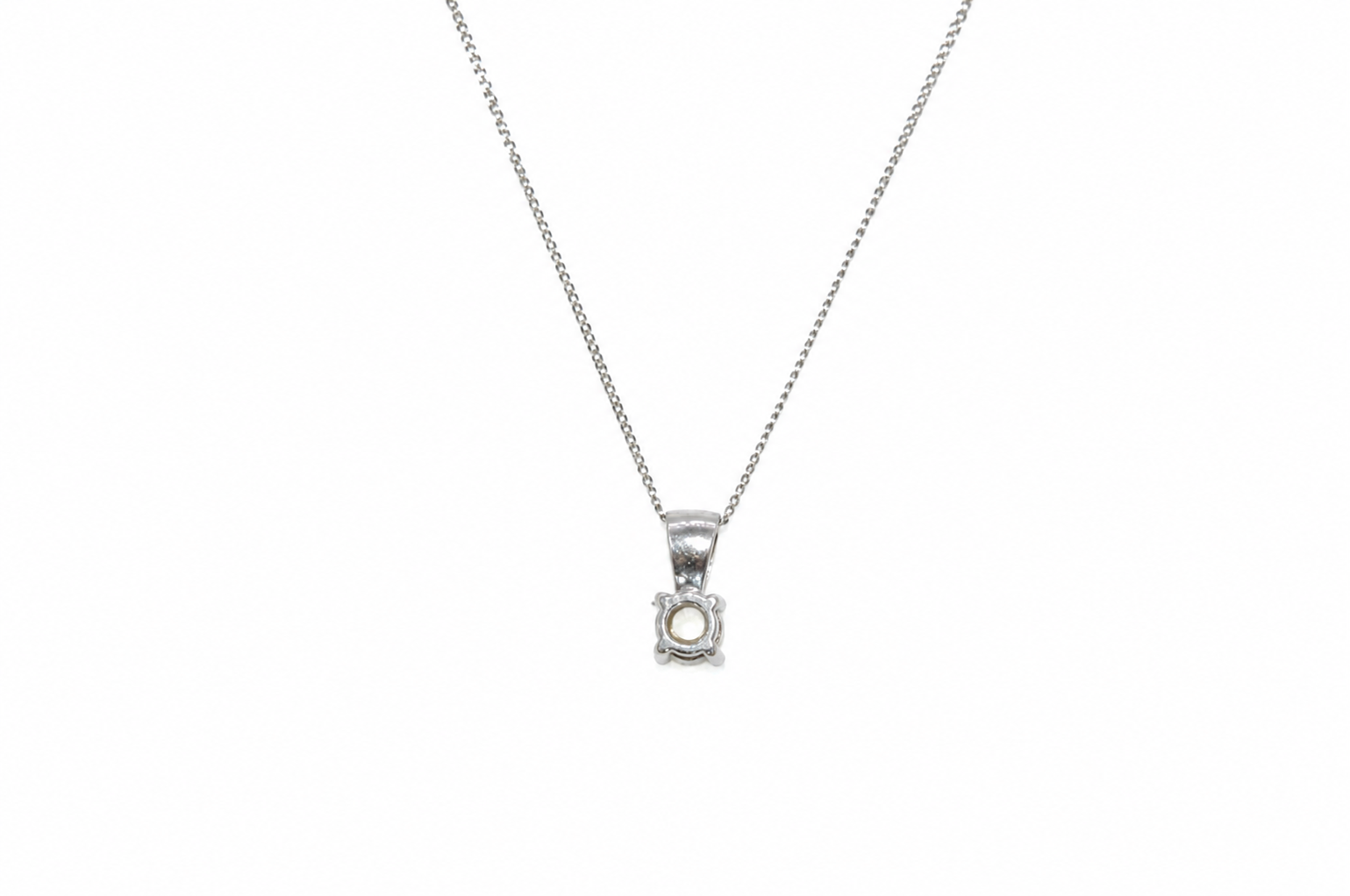 Reverse view of diamond solitaire pendant
