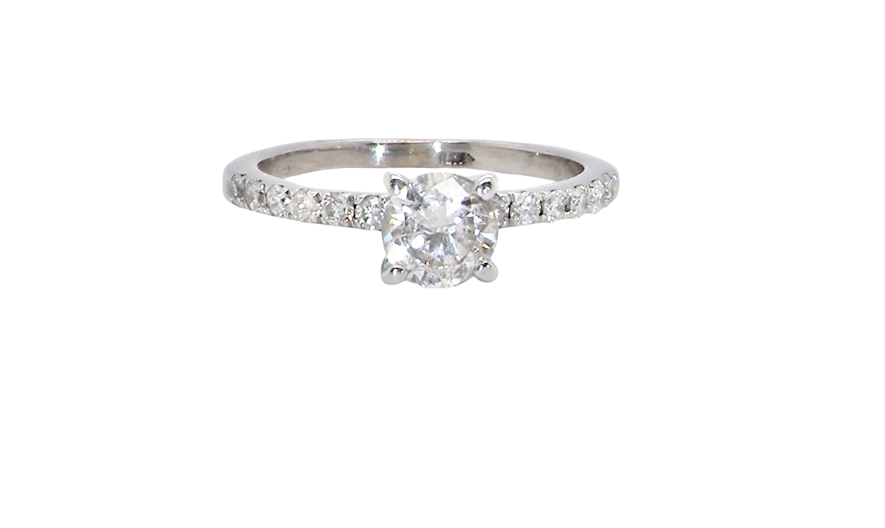 A stunning 14-carat white gold* solitaire ring featuring a brilliant-cut white diamond.
