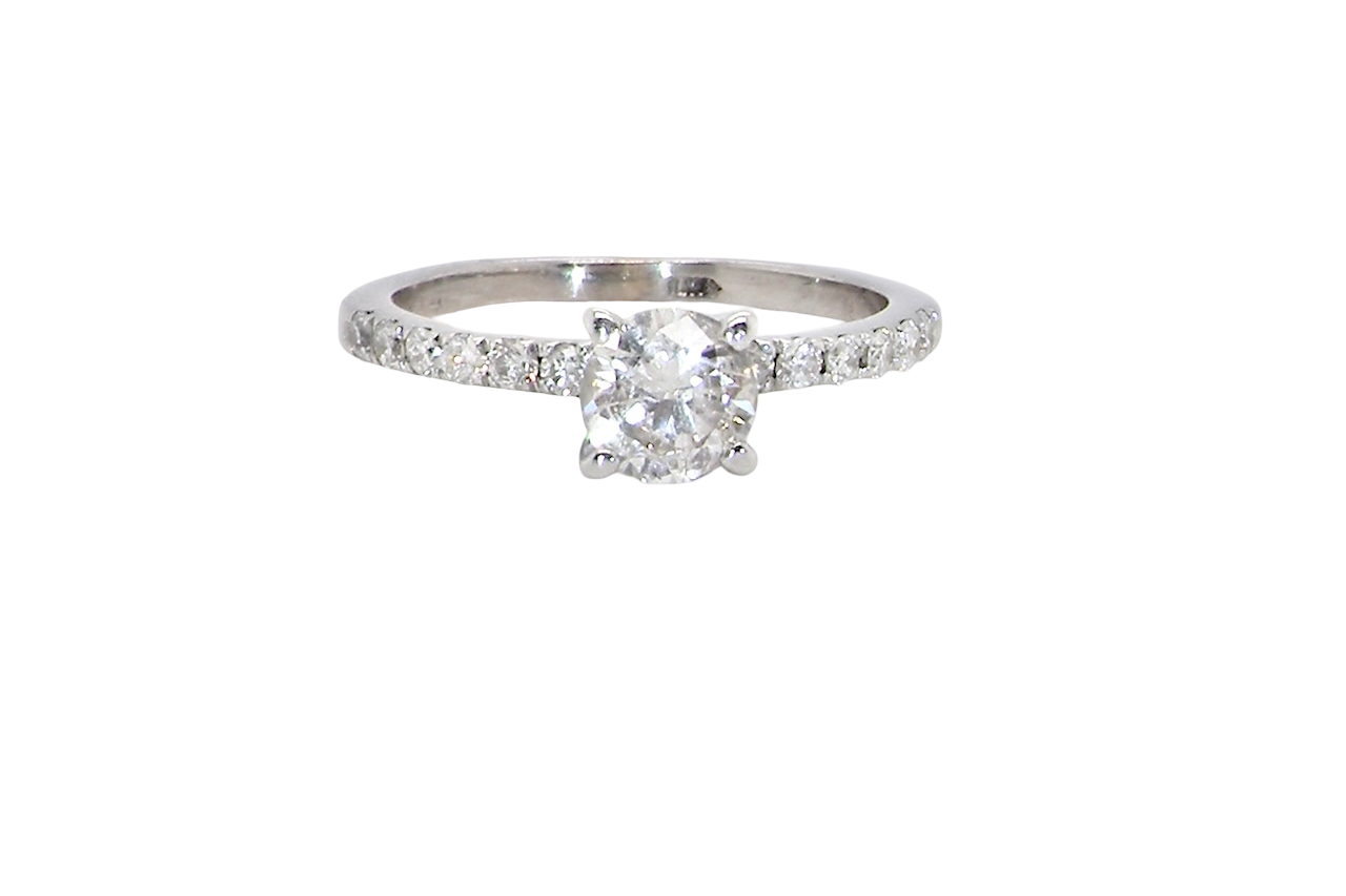 A stunning 14-carat white gold* solitaire ring featuring a brilliant-cut white diamond.