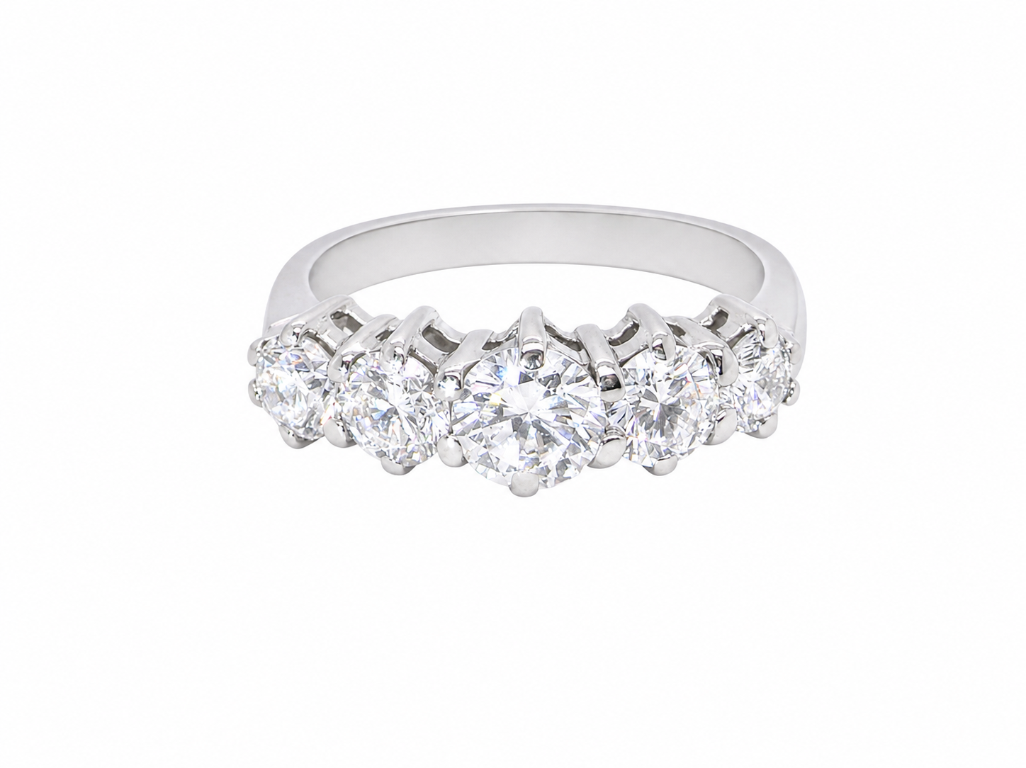 A stunning half hoop ring featuring five exceptional brilliant-cut white diamonds, expertly claw set in 18ct white gold.