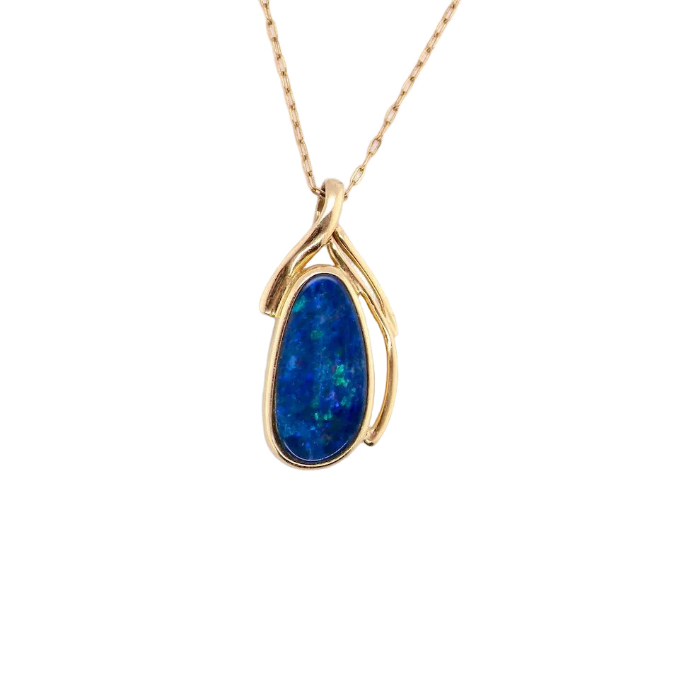 A stunning pendant containing an oval shaped black opal