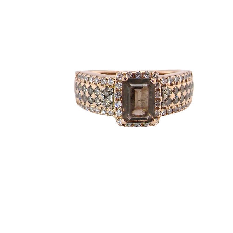 A stunning ring from the House of Le Vien. Crafted from 14ct Strawberry Gold, this Le Vian ring is characterised by a gallery of brown/white diamonds set into each shoulder
