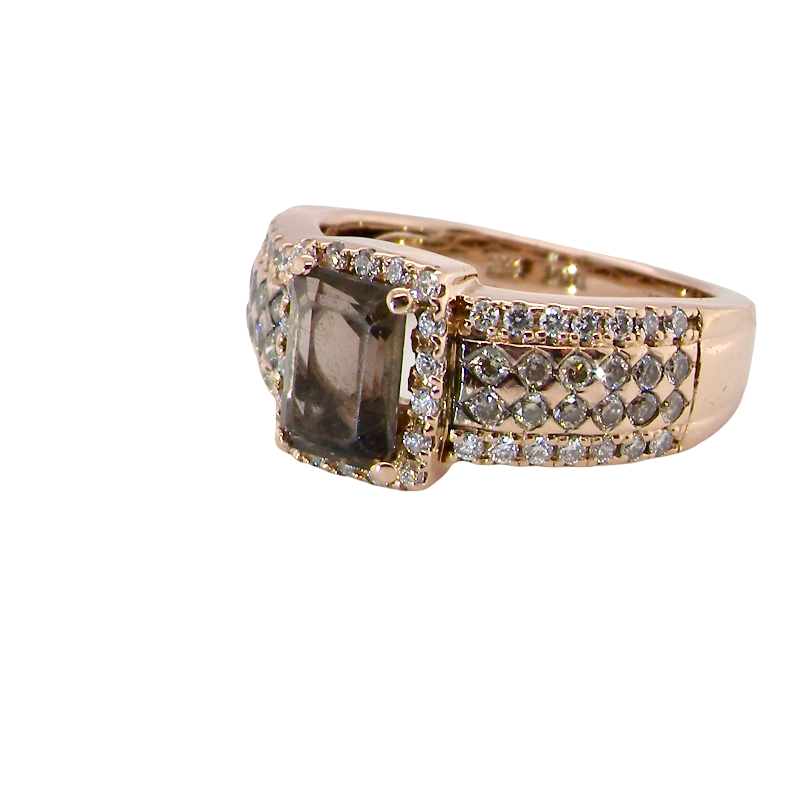 A stunning ring from the House of Le Vien. Crafted from 14ct Strawberry Gold, this Le Vian ring is characterised by a gallery of brown/white diamonds set into each shoulder-side