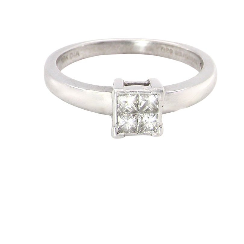 A stylish modern 18 carat white gold diamond cluster ring, with a beautifully clean and understated design.
The square-shaped head is set with 4 Princess cut white diamonds,