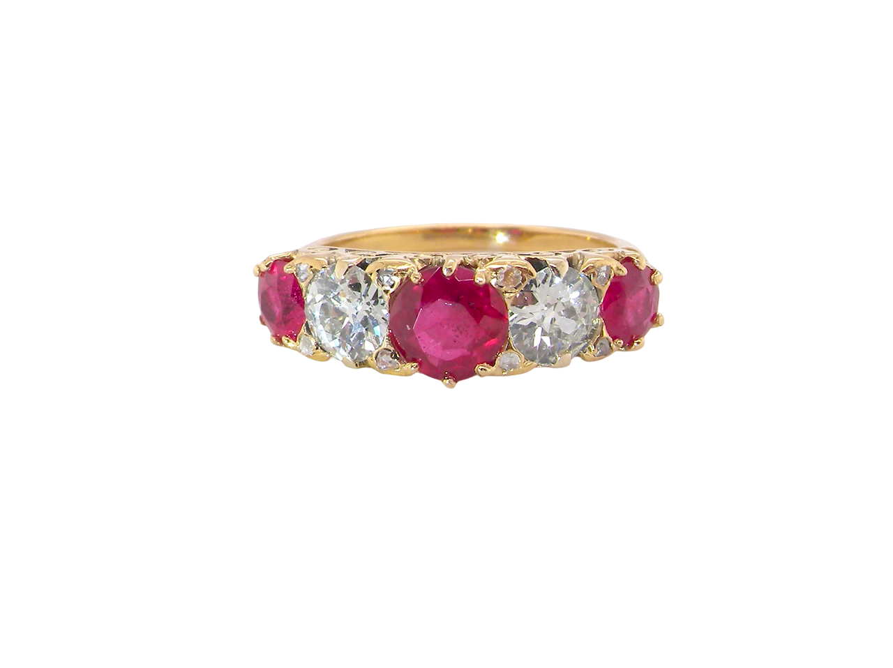 A superb Victorian ring, carved boat shaped head. Set with fine rubies ,