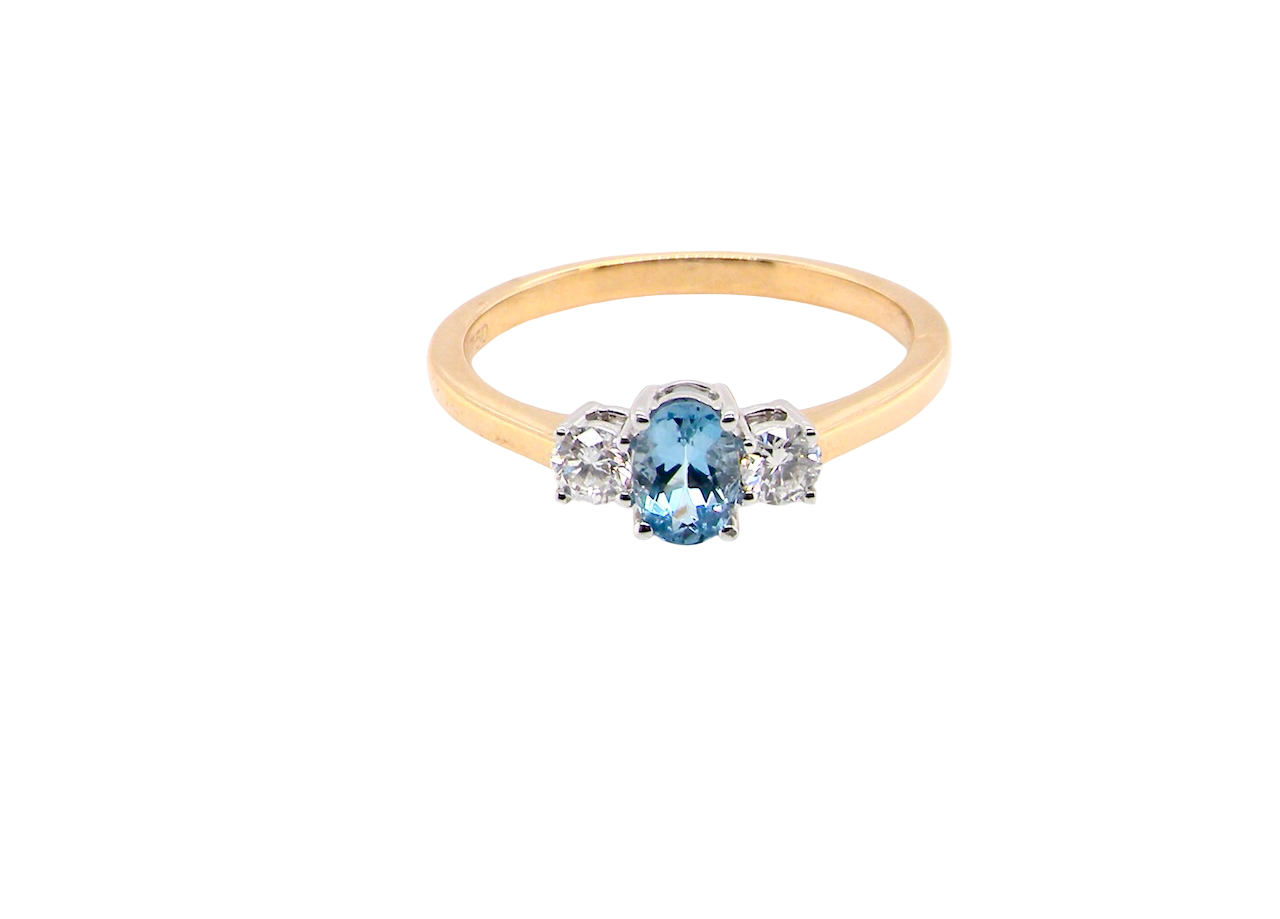 A three stone Aquamarine and Diamond ring