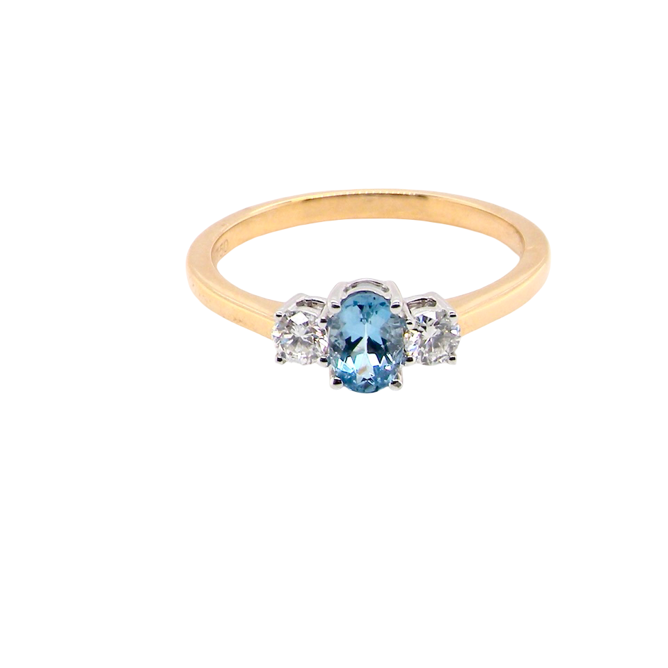 A three stone Aquamarine and Diamond ring