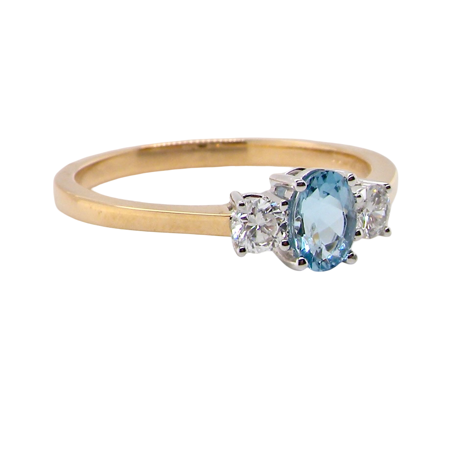 A three stone Aquamarine and Diamond ring