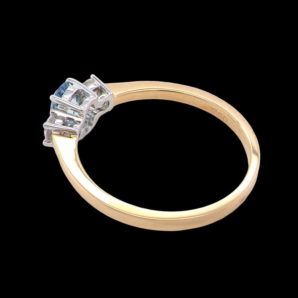 A three stone Aquamarine and Diamond ring