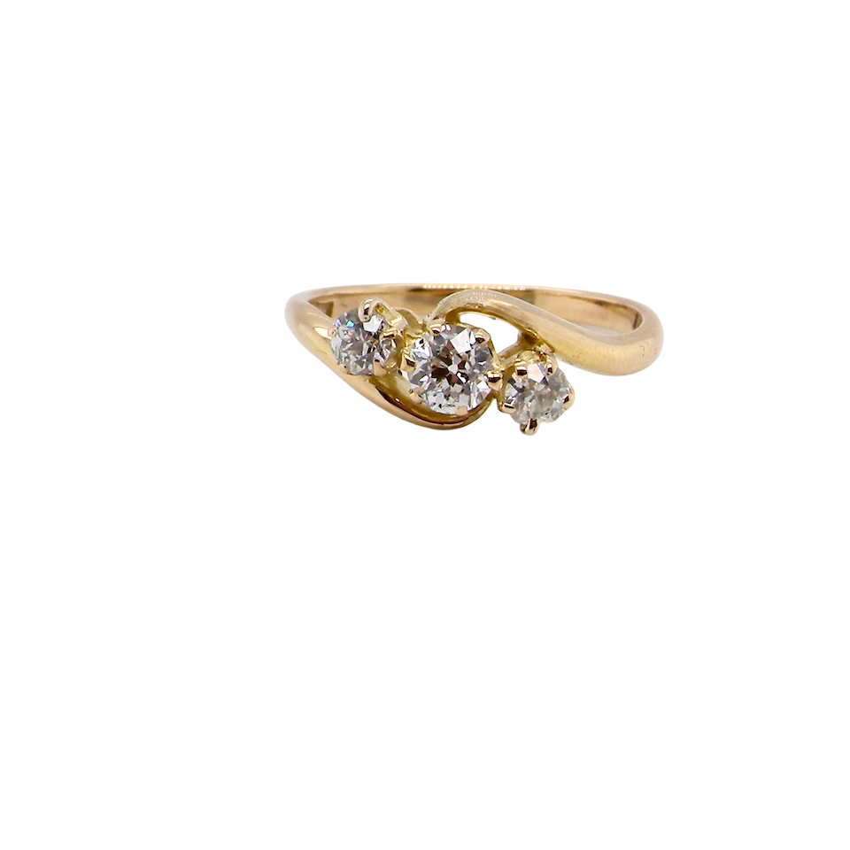 A three stone Diamond Cross Over ring