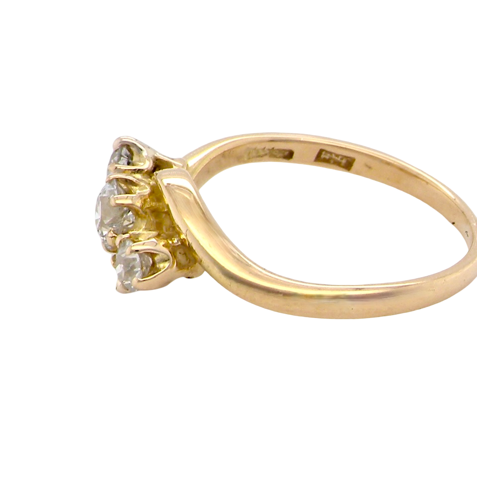 A three stone Diamond Cross Over ring