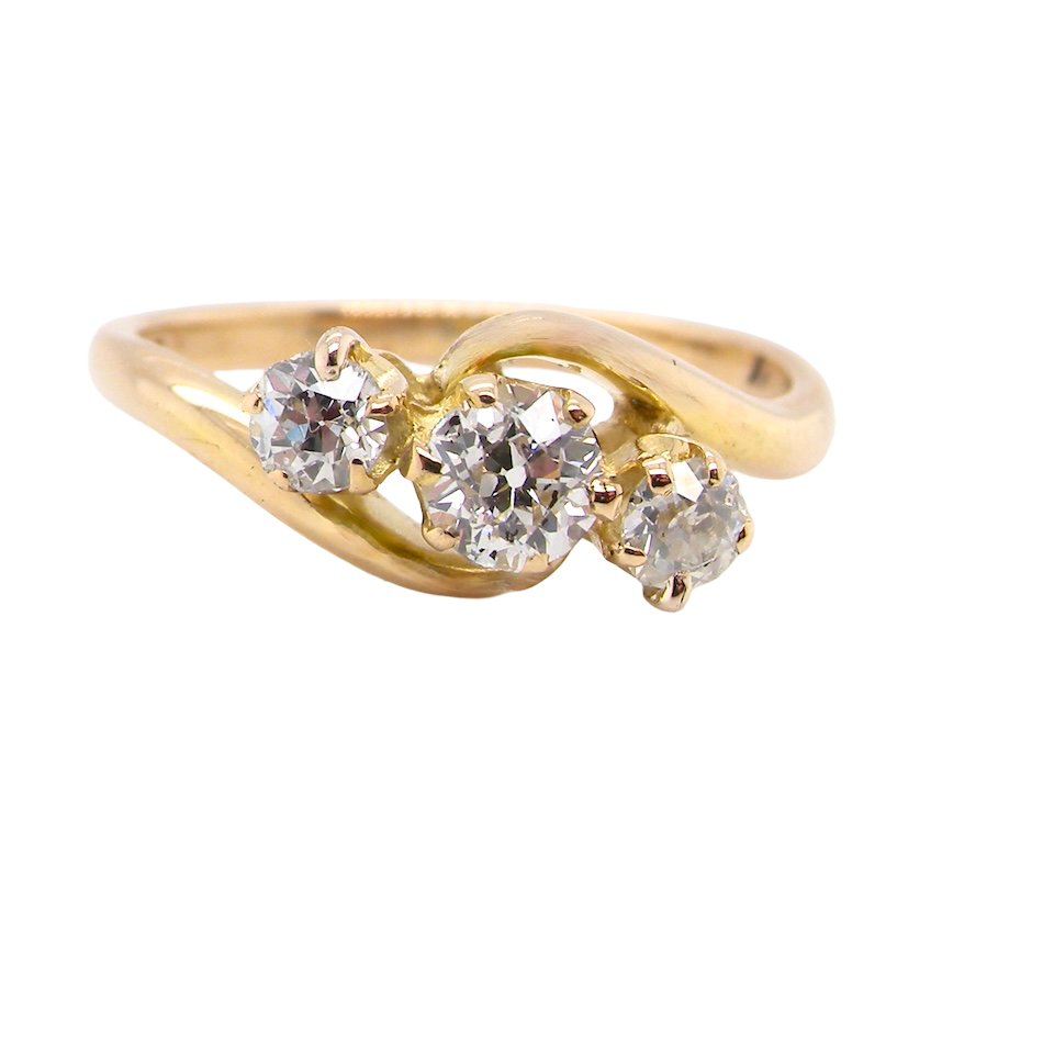 A three stone Diamond Cross Over ring