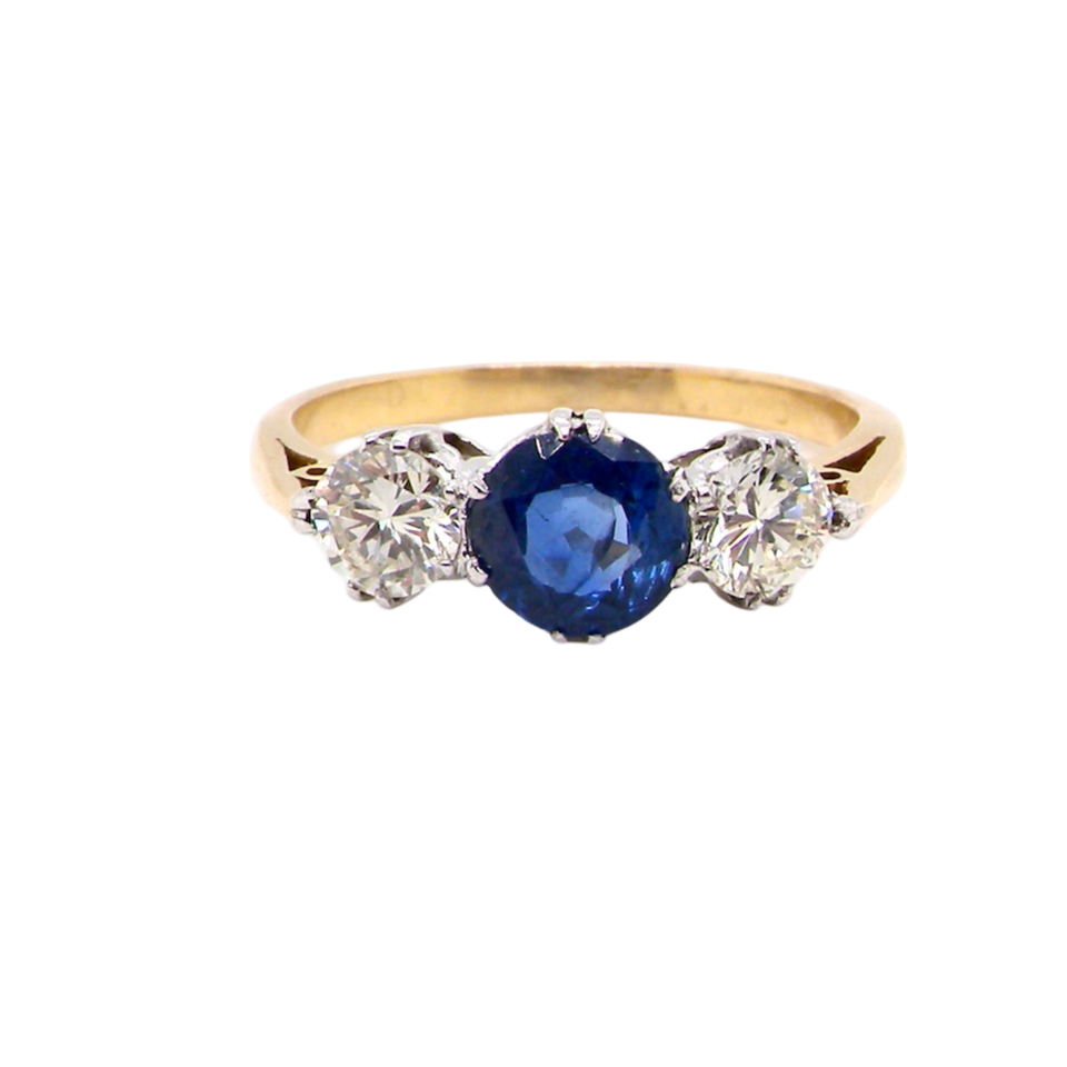 A three stone Sapphire and Diamond ring