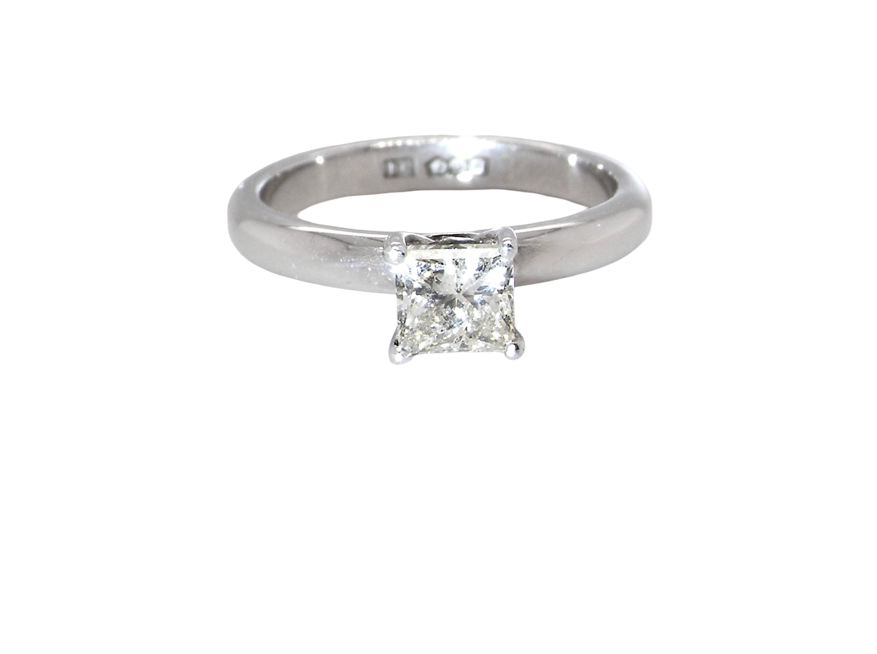 A timeless and beautifully crafted solitaire ring featuring a stunning 0.78 carat Princess-cut white diamond