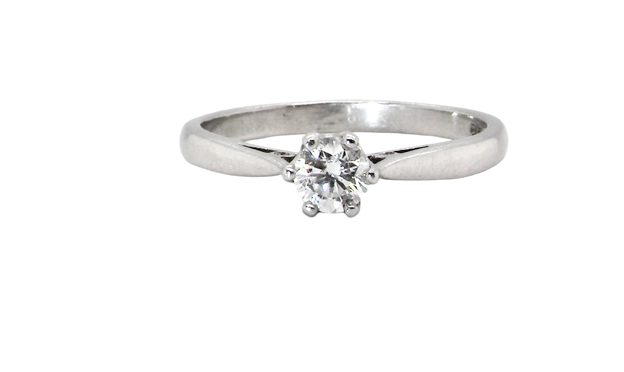A timeless and elegant solitaire ring set with a brilliant-cut white diamond