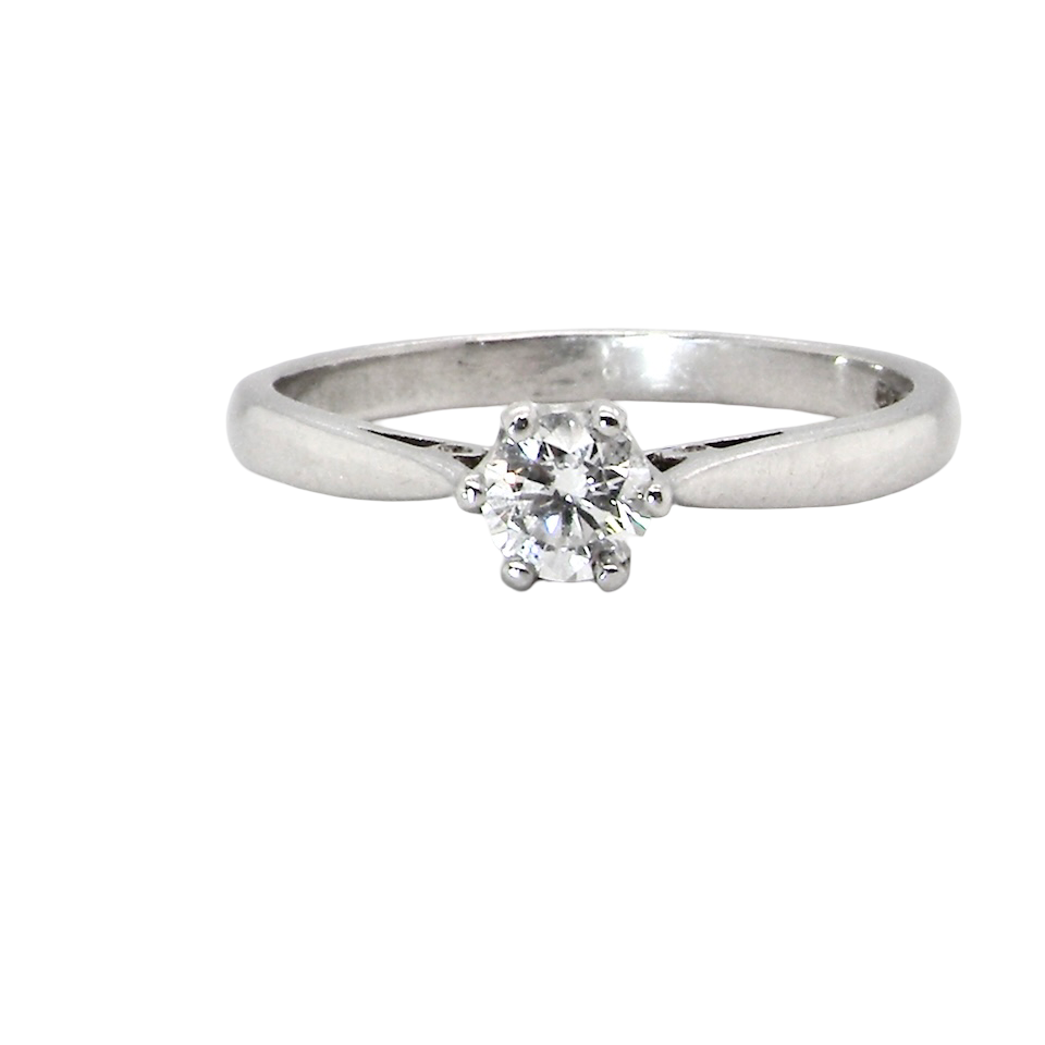 A timeless and elegant solitaire ring set with a brilliant-cut white diamond