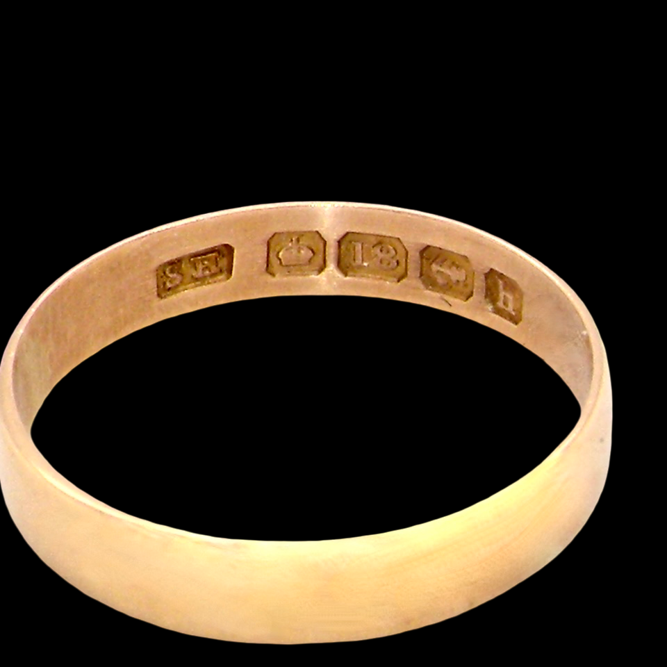 A traditional 18 carat gold wedding ring.
A flat to a slight D shape profile, width 3.6mm.