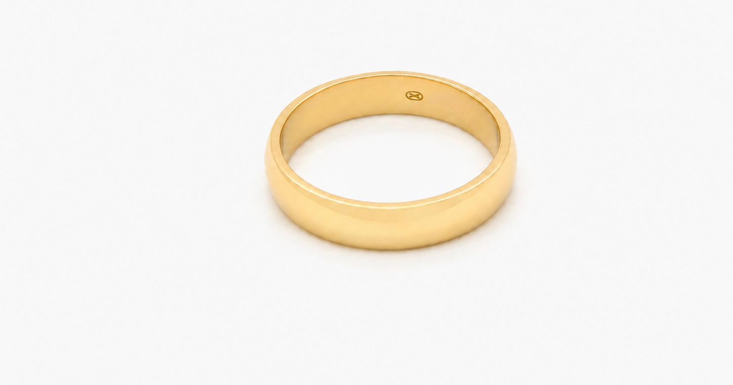 A traditional 18 carat gold wedding ring. D shape profile.
5.6grams