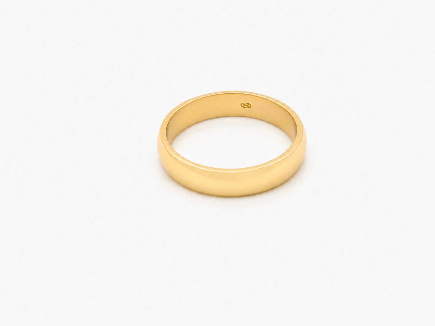 A traditional 18 carat gold wedding ring. D shape profile.
5.6grams