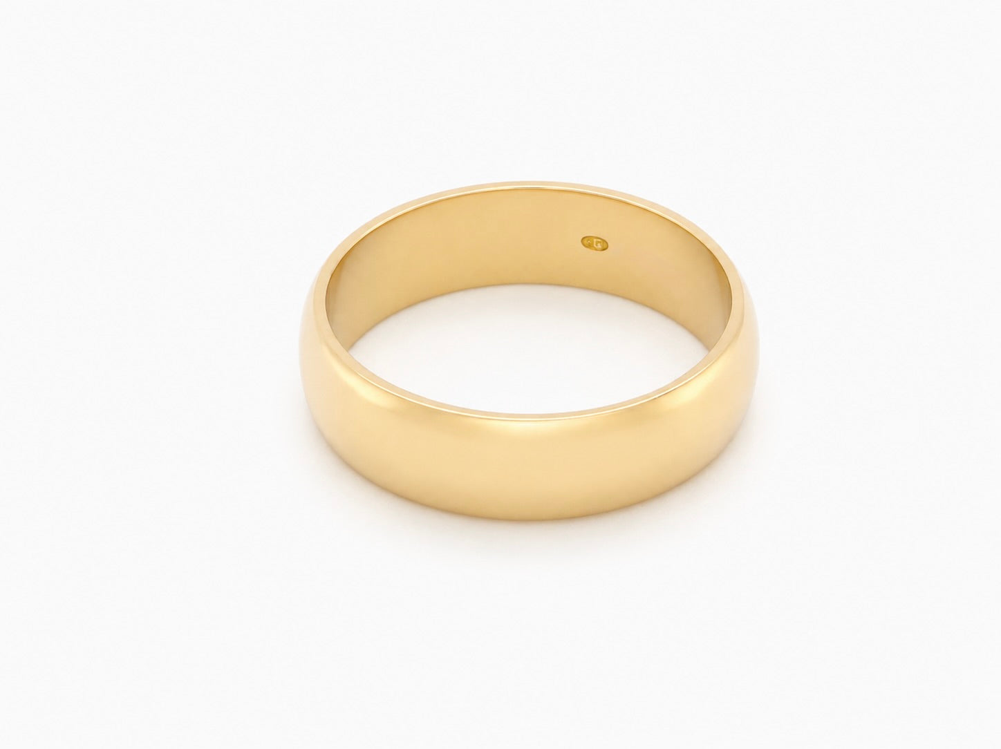 A traditional 18 carat gold wedding ring. D shape profile.
Substantial weight at 5.6grams