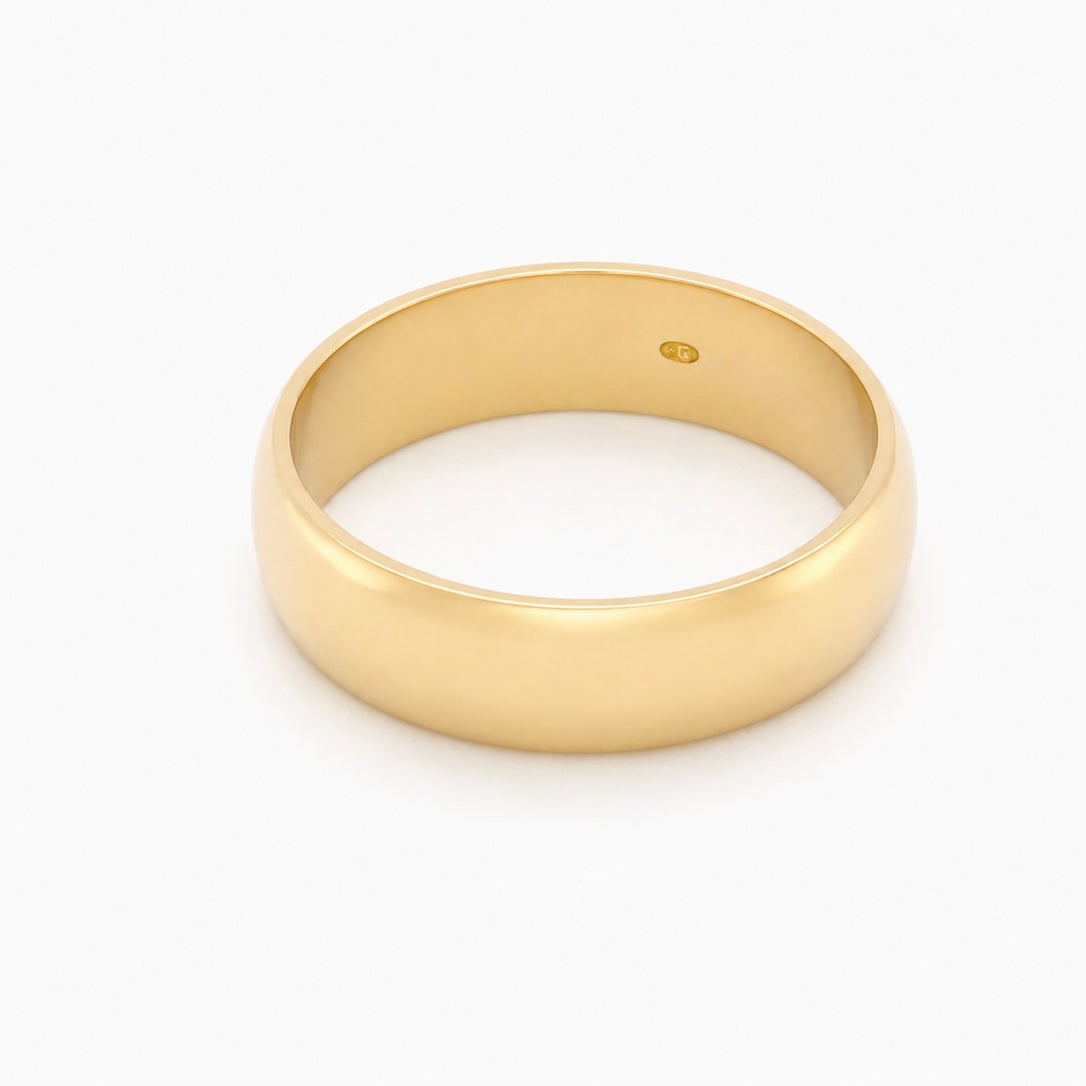 A traditional 18 carat gold wedding ring. D shape profile.
Substantial weight at 5.6grams