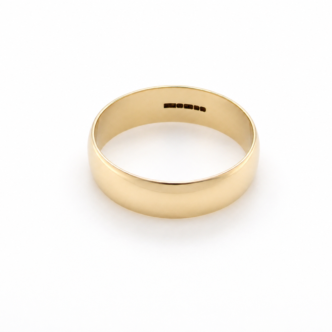 A traditional 9 carat gold wedding ring. 6mm width, D profile