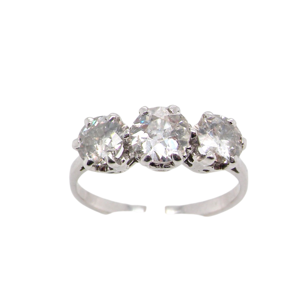 a traditional 3 stone trilogy ring