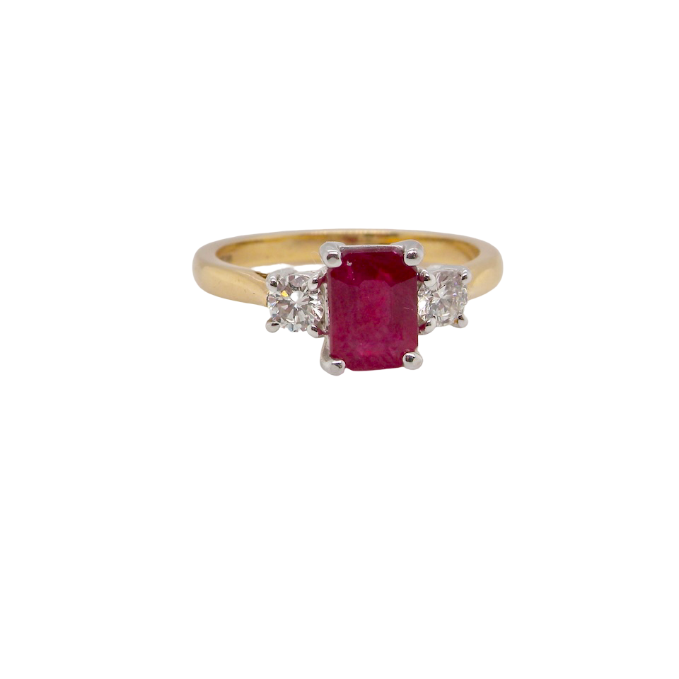 A traditional Ruby and Diamond three stone ring