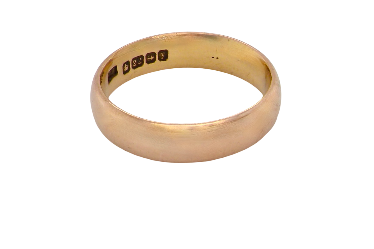 A traditional wedding ring. 22 carat gold (almost pure gold), D shape profile.
Width 4.7mm.
