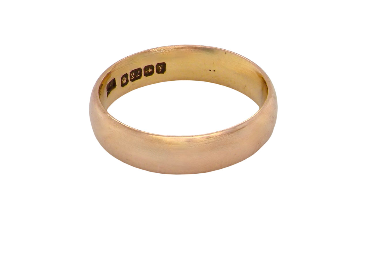 A traditional wedding ring. 22 carat gold (almost pure gold), D shape profile.
Width 4.7mm.