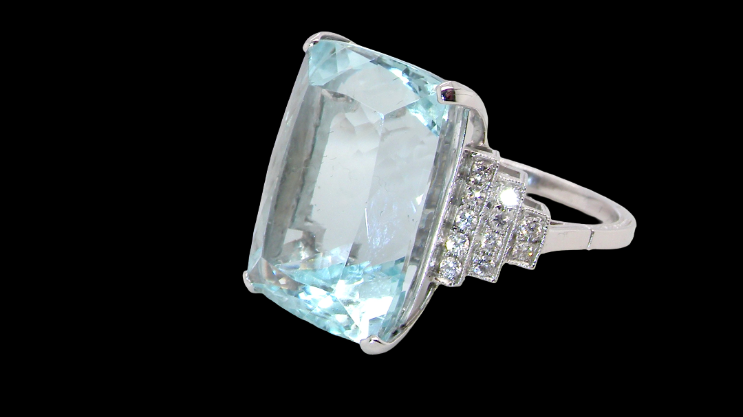 A truly spectacular vintage statement ring, centred with an impressive rectangular-cut aquamarine of exceptional proportions.
