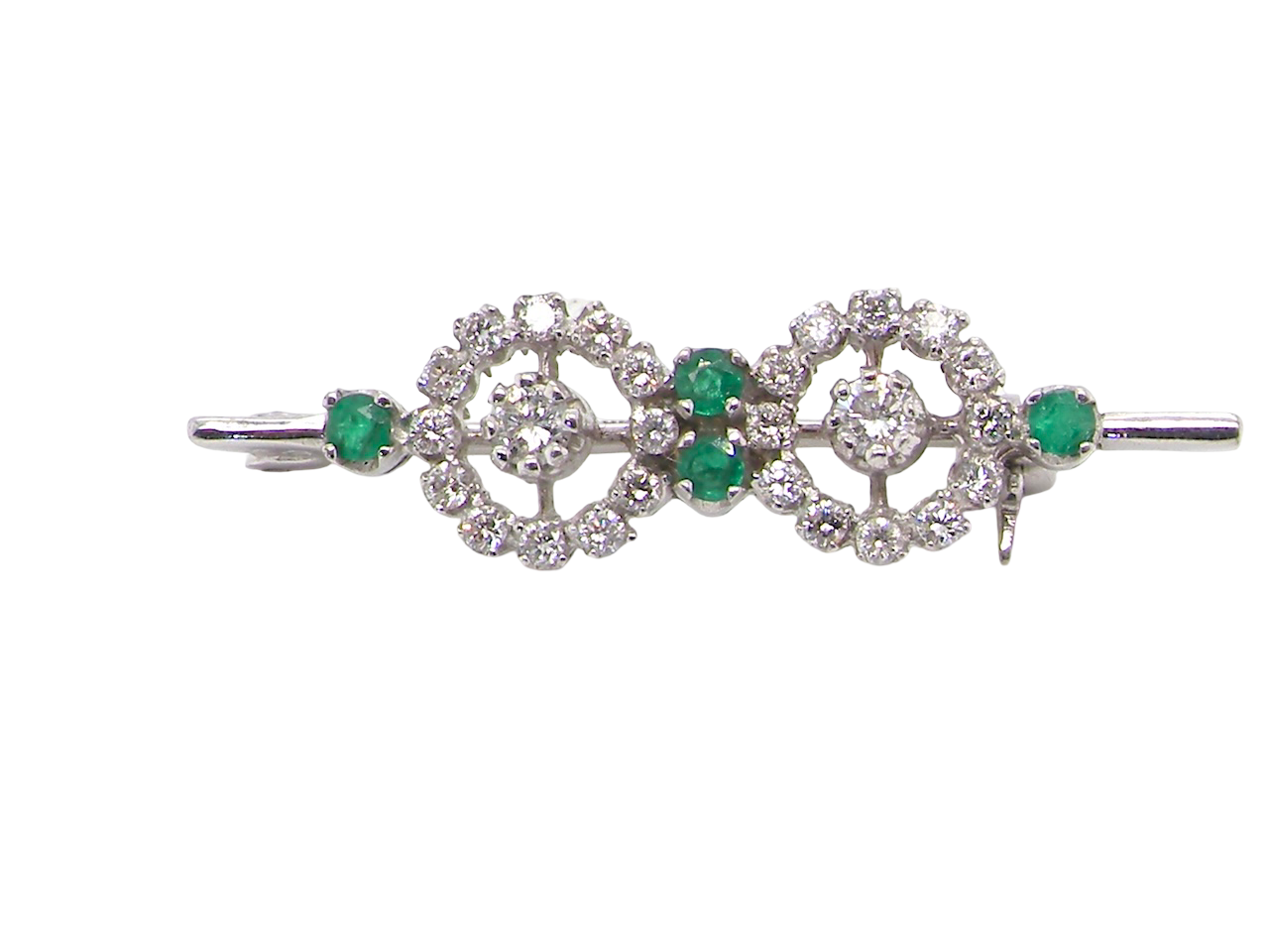 A very pretty and wearable brooch. A double cluster of brilliant cut white diamonds, each set to the centre with an 0.10 carat stone and surrounded by twelve x 0.015 carat stones*. 