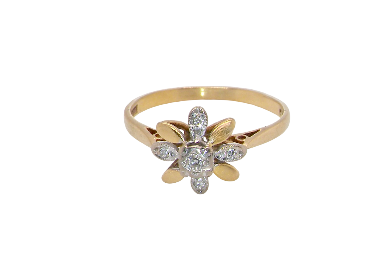 A very pretty cluster ring, a design from the 1950s. Its daisy style was popular during this period, and set with five small white diamonds (total est. 0.05 carats) set into platinum.