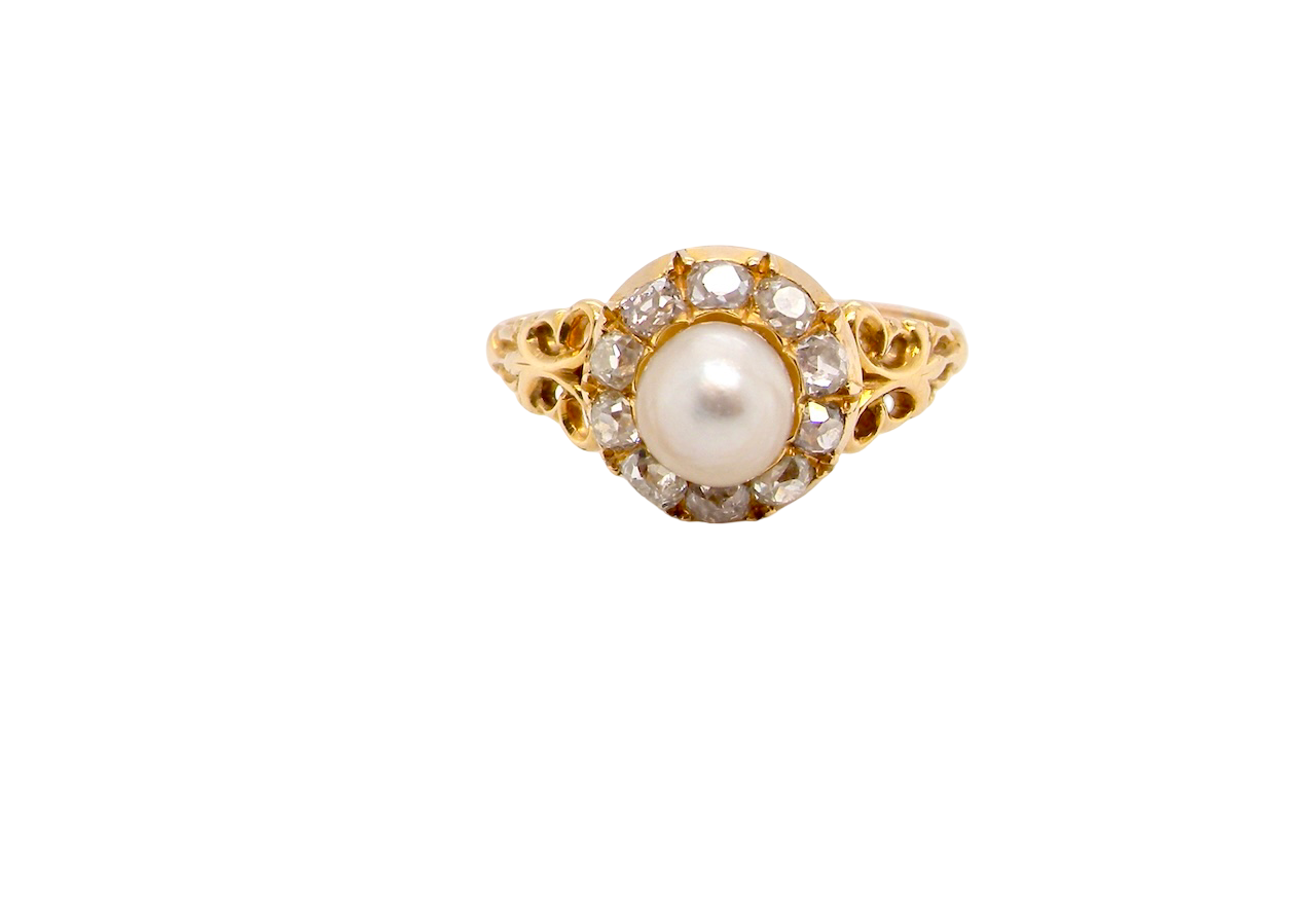 A very pretty cluster ring set with a central cultured pearl
