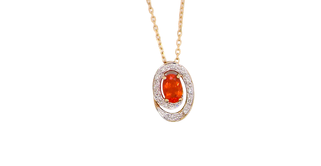 A very pretty pendant set with a fireglow orange Fire Opal. Measures 6x4mm (0.50 carats).