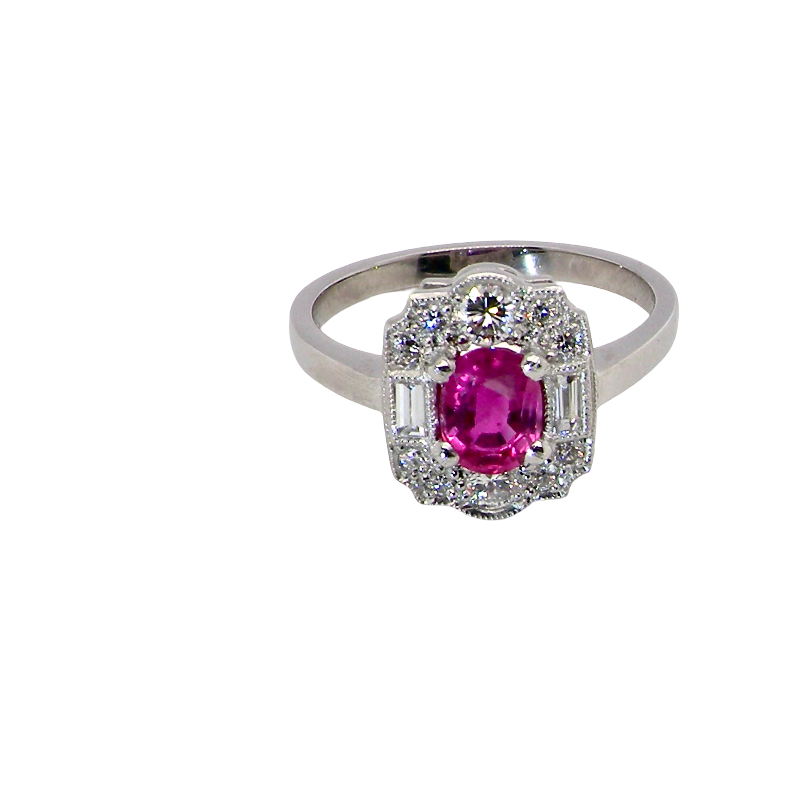 A very pretty ring that features an oval cut pink sapphire, 6x4mm 