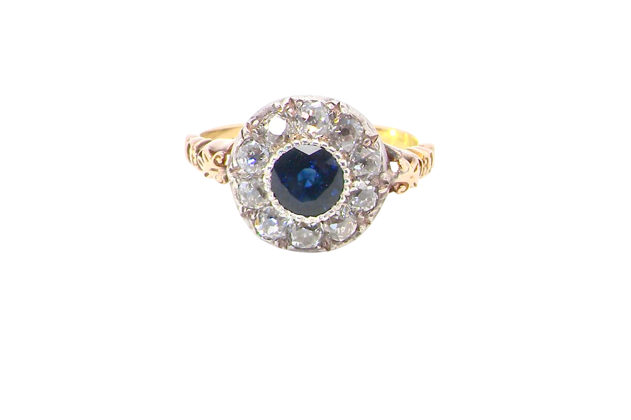 A vintage Sapphire and Diamond cluster ring early 20th century