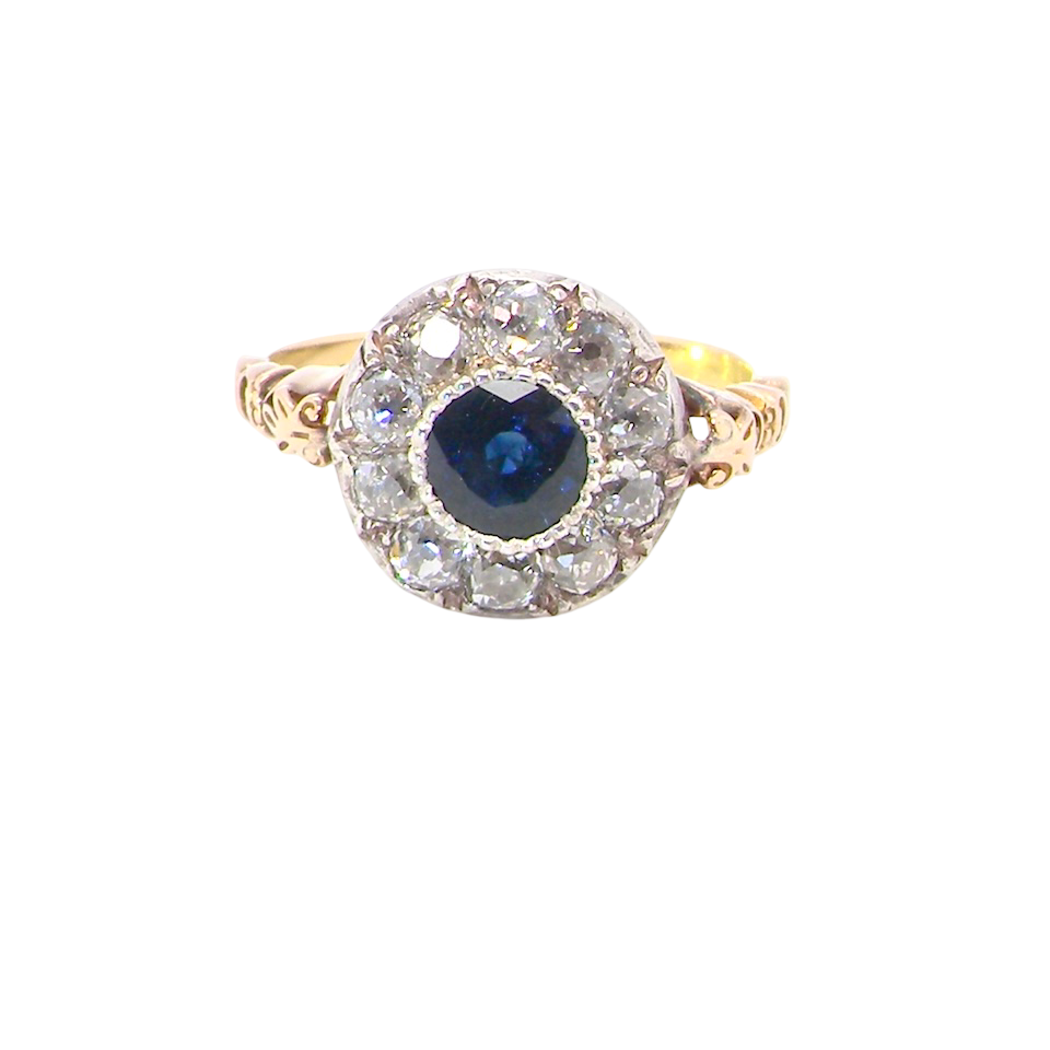 A vintage Sapphire and Diamond cluster ring early 20th century