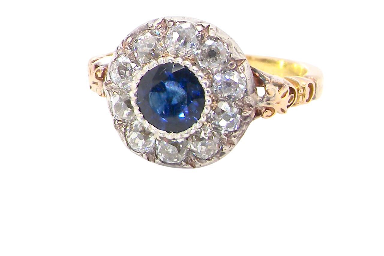 cl;ose up A vintage Sapphire and Diamond cluster ring early 20th century