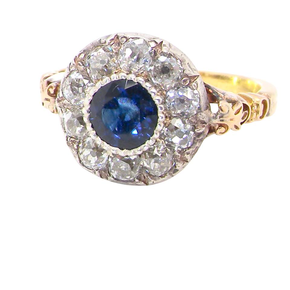 cl;ose up A vintage Sapphire and Diamond cluster ring early 20th century