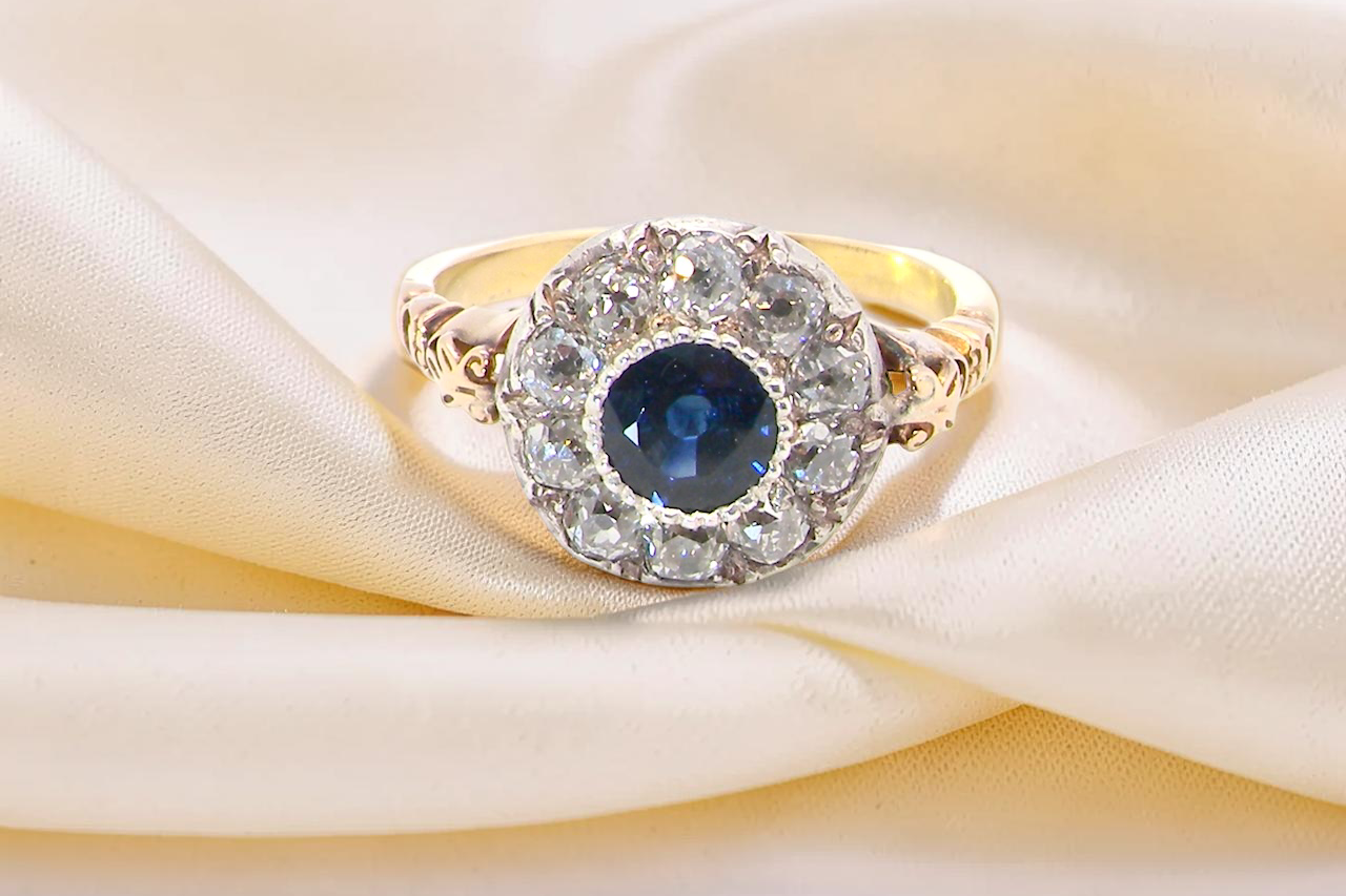 A vintage Sapphire and Diamond cluster ring early 20th century style