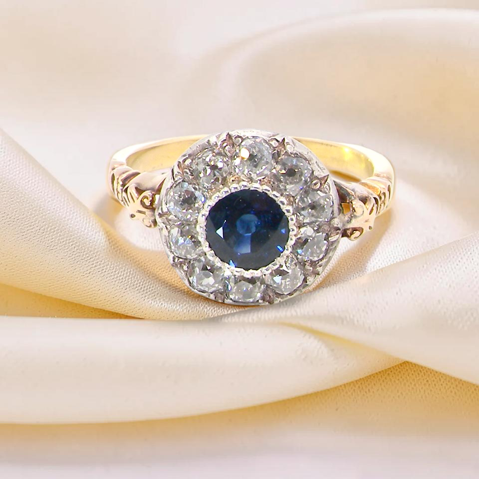 A vintage Sapphire and Diamond cluster ring early 20th century style
