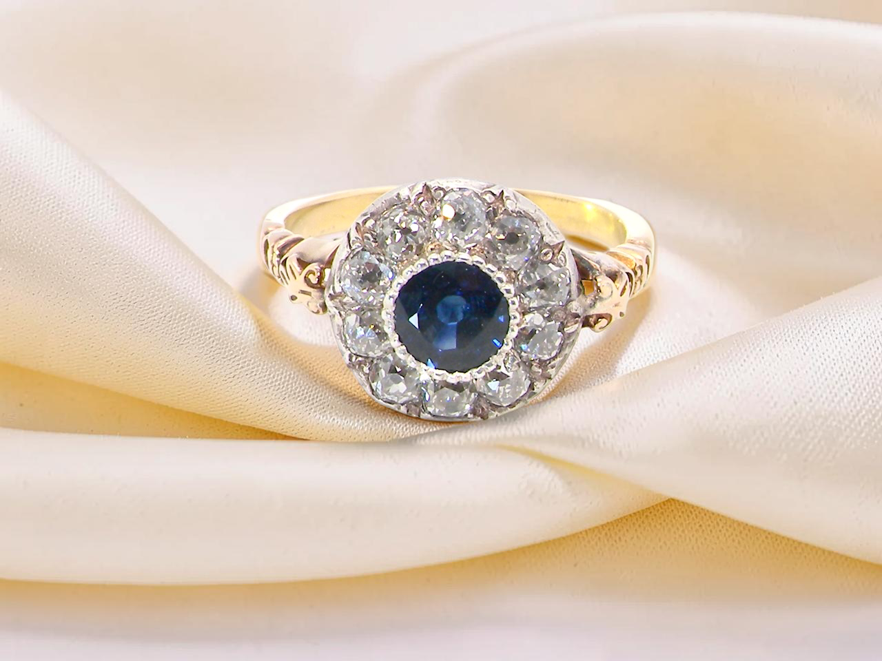 A vintage Sapphire and Diamond cluster ring early 20th century style