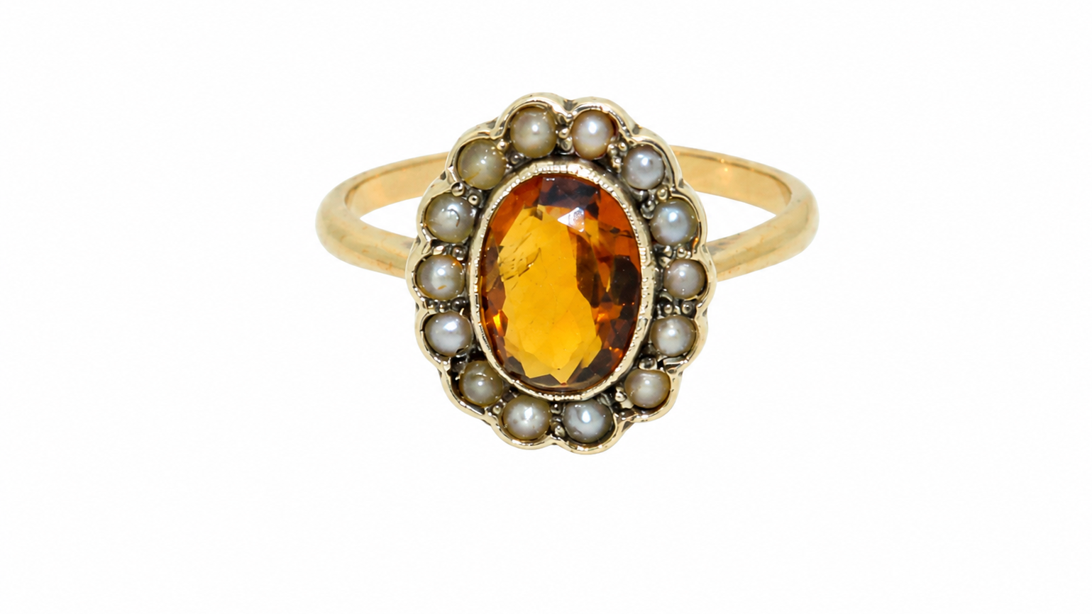 A vintage citrine and diamond oval ring