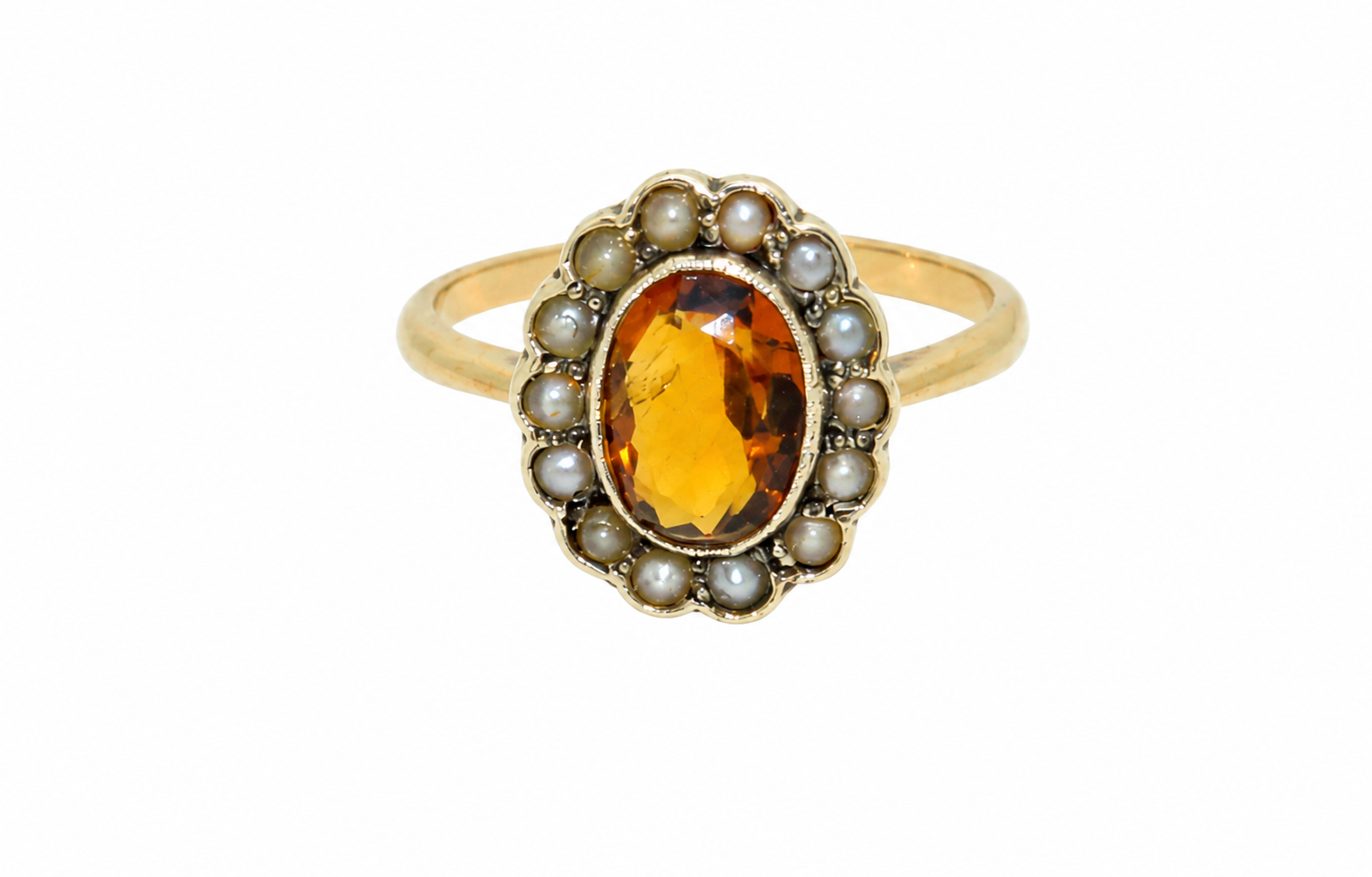 A vintage citrine and diamond oval ring