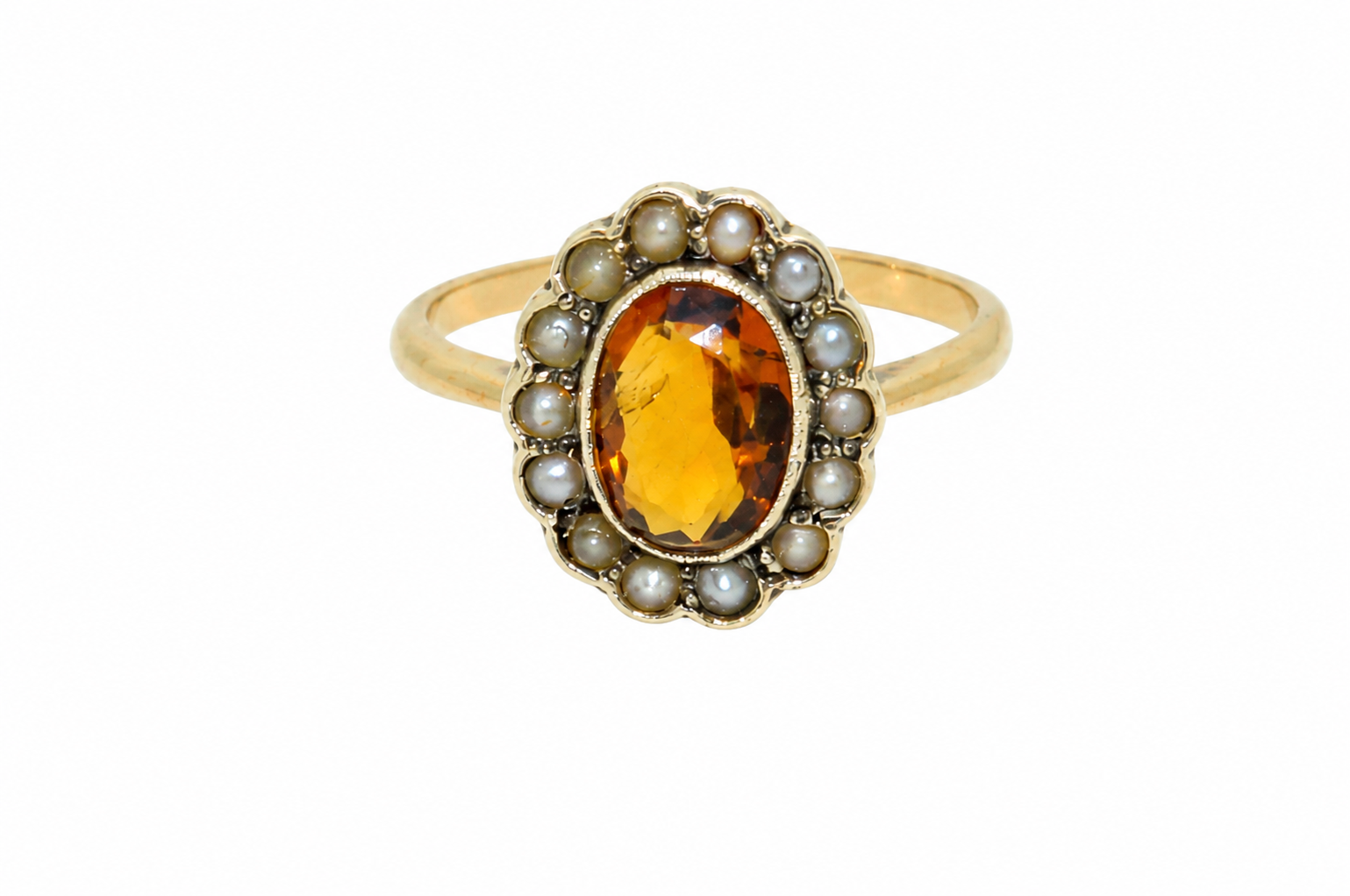 A vintage citrine and diamond oval ring
