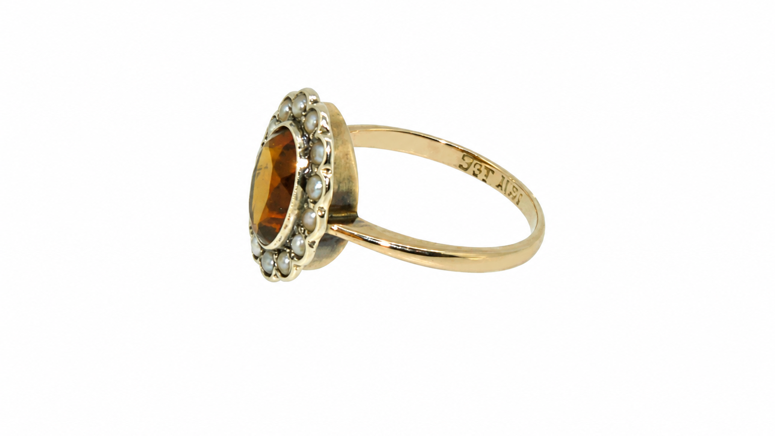 A vintage citrine and diamond ring side view