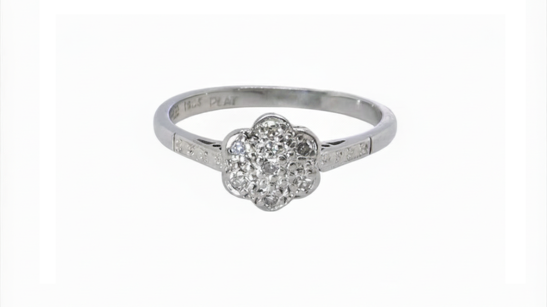 A vintage white gold diamond cluster ring