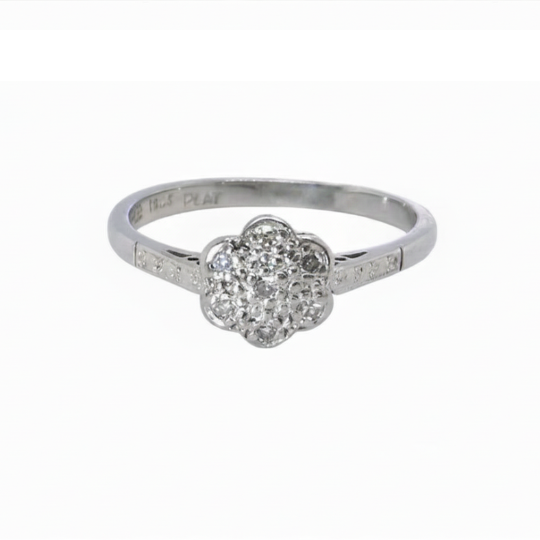 A vintage white gold diamond cluster ring